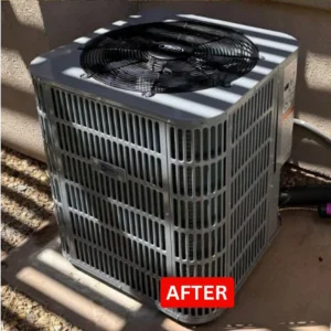New AC condenser after replacement beside a Las Vegas home